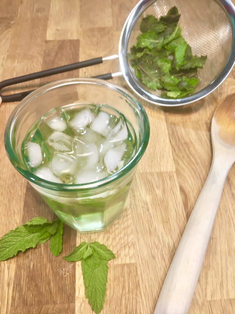 A refreshing glass of mint iced tea
Photo Credit Laura Scalone